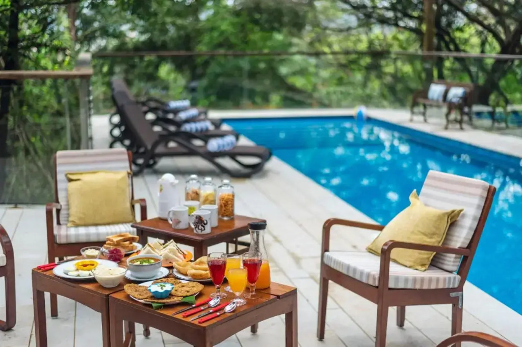 SaffronStays Odeon - 4BR heritage art deco villa with cantilever pool, verandahs & forested lawns