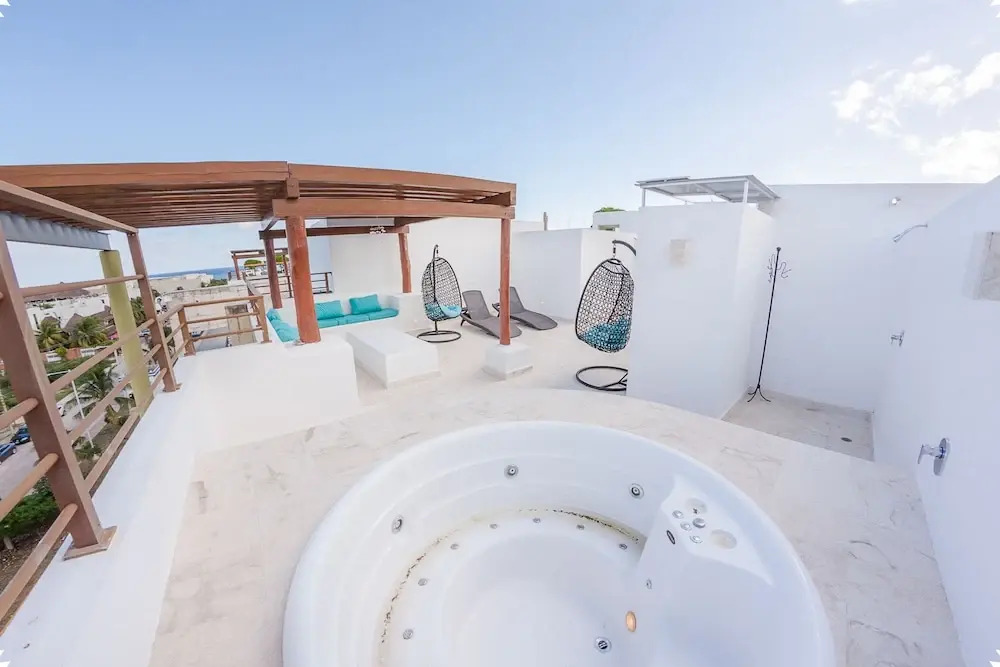 Fun and Relaxing  2BR PH steps away from the beach by Happy Address