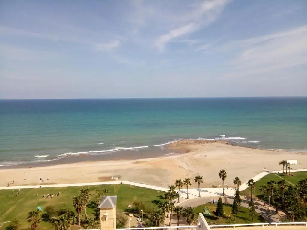 Apartamento 1ª Línea de mar en Marina d'Or con césped y playa [Familiar]