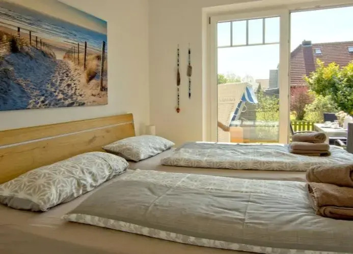 Inselparadies - Neubauwohnung mit großer Terrasse, Strandkorb und Garten