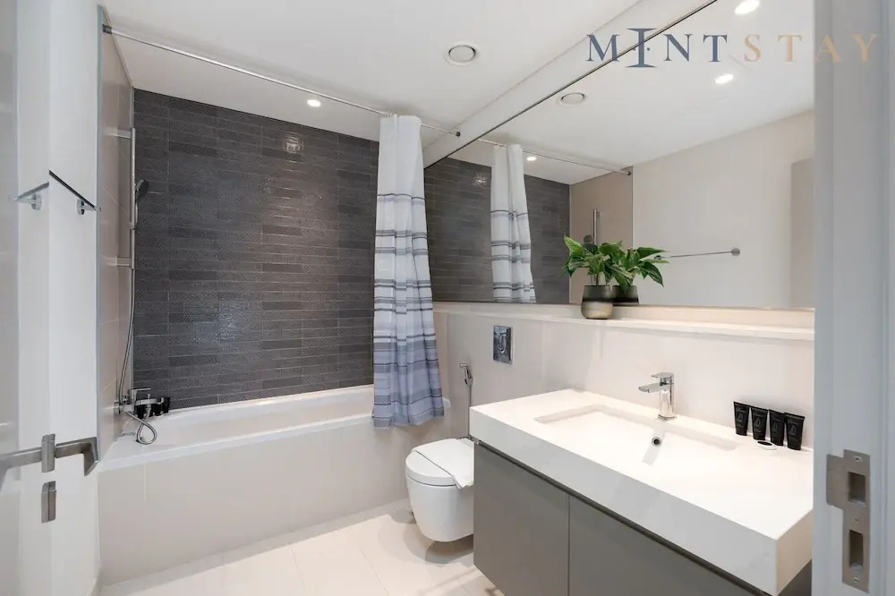 Elegant 2BR Emaar Beachfront Retreat