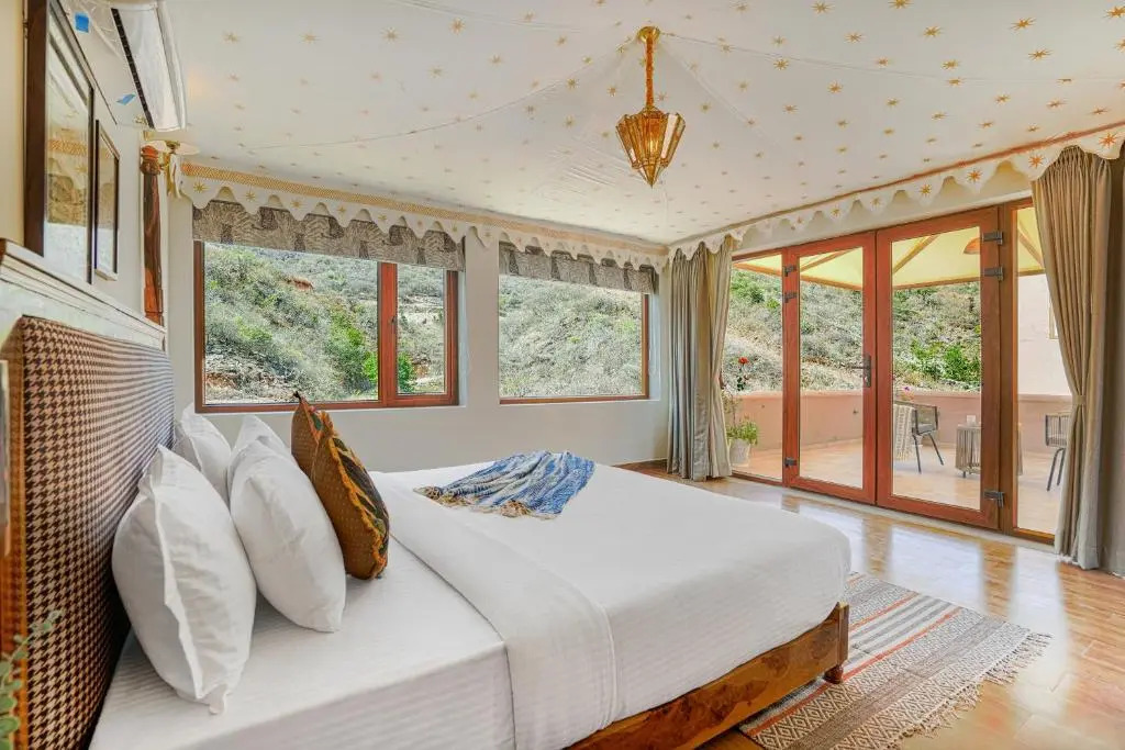 SaffronStays Moringa WishingTree - 3-BR villa near Nathdwara with pool, lawn and hillside views
