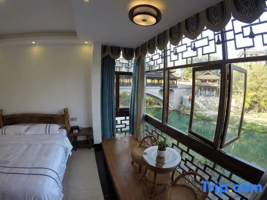 Huaqianshu Theme Inn 高铁免费接站或送站一次