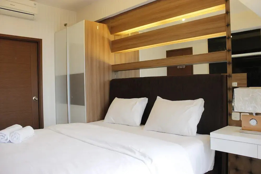 Homey 2BR Apartment at Sudirman Suite