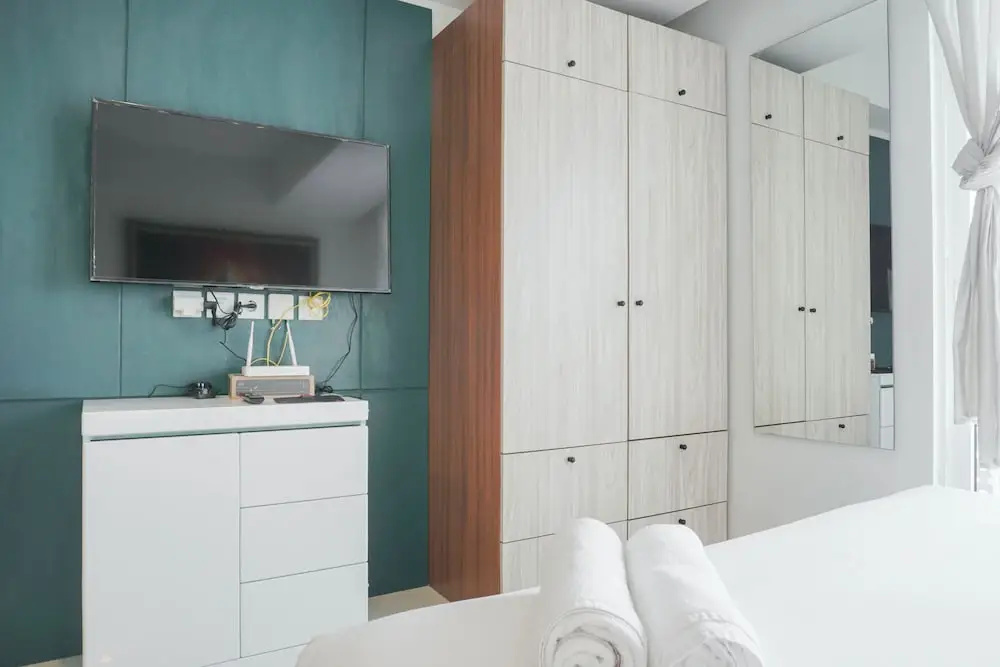 Minimalist Studio Room With City View At West Vista Apartment