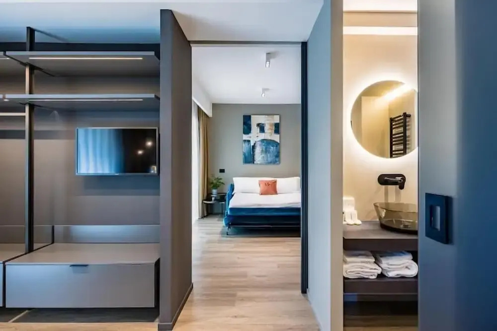 MH SUITES Plebiscito