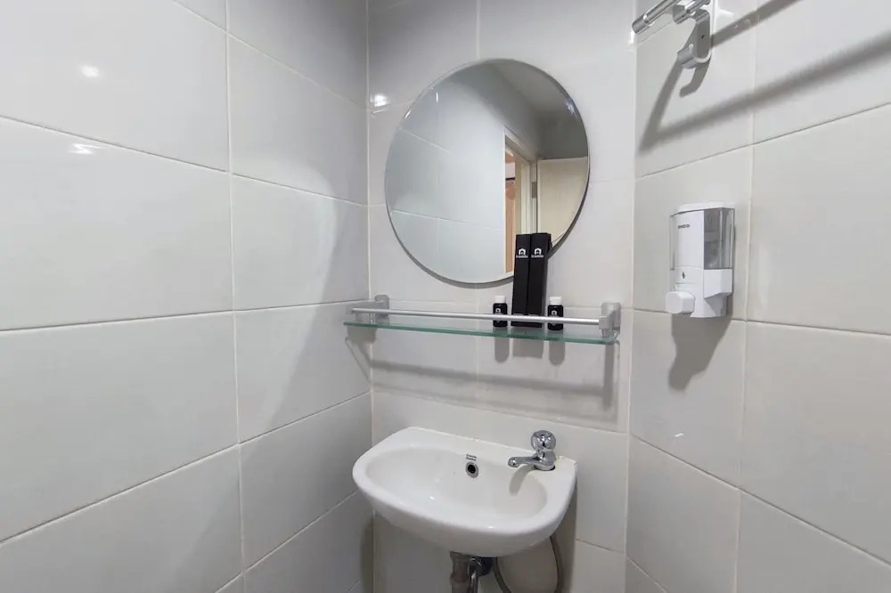 Homey 1BR without Living Room at Amartha View Apartment By Travelio