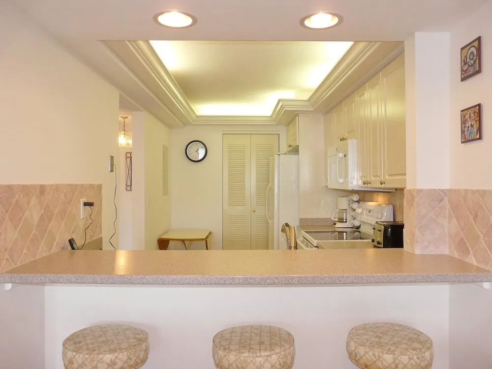 Condo Overlooking Clam Bay With Pool and Beach Access