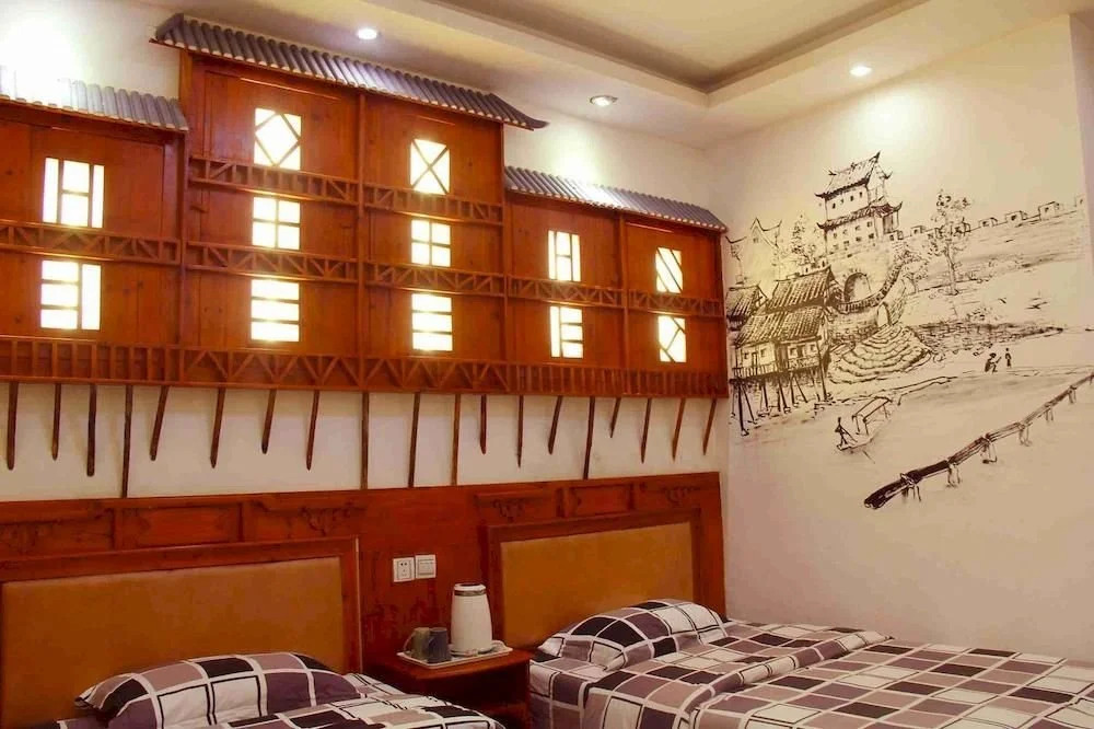 Happy Utopia B&B (Fenghuang Ancient City Nanhua Branch)