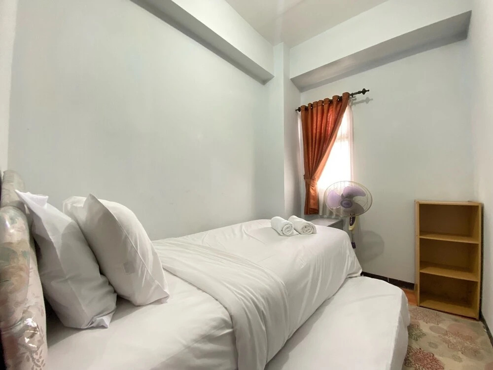 Modern Designed 2BR at Suites @Metro Apartment By Travelio