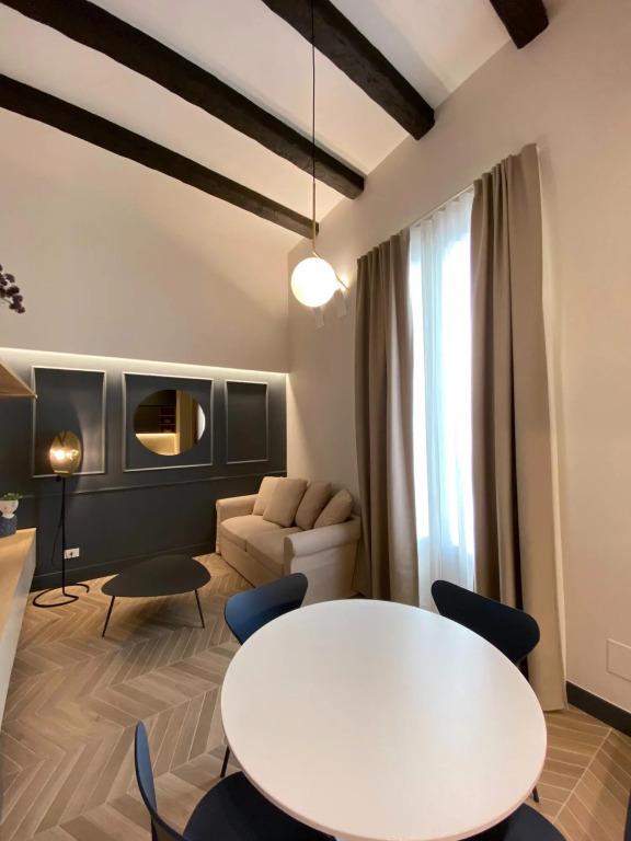 Apartment suitable for families or couples, equipped kitchen and laundry corner, private balcony-Mattia by Dimore Garibaldi