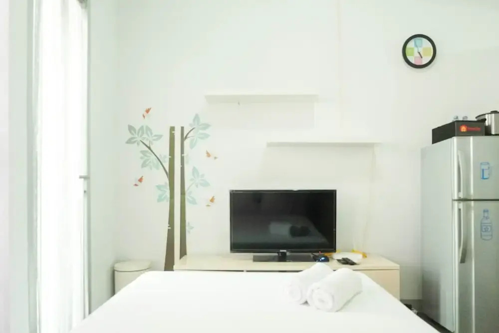 Comfy & Clean Studio Apartment at Puri Mas