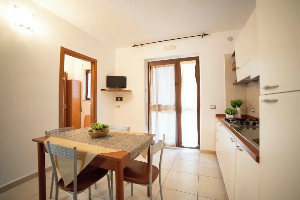 Apartment ulivo with pool and private beach