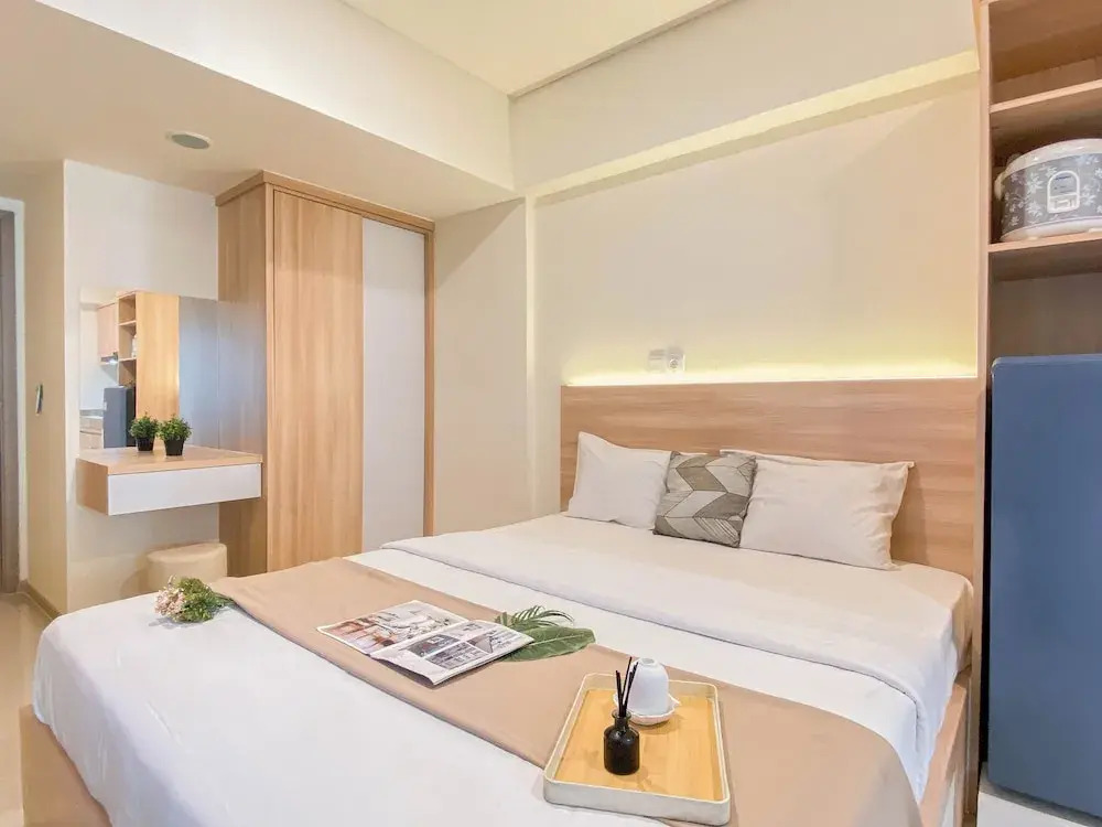 Warm Minimalist Studio Apartment Near Paramadina University At Meikarta