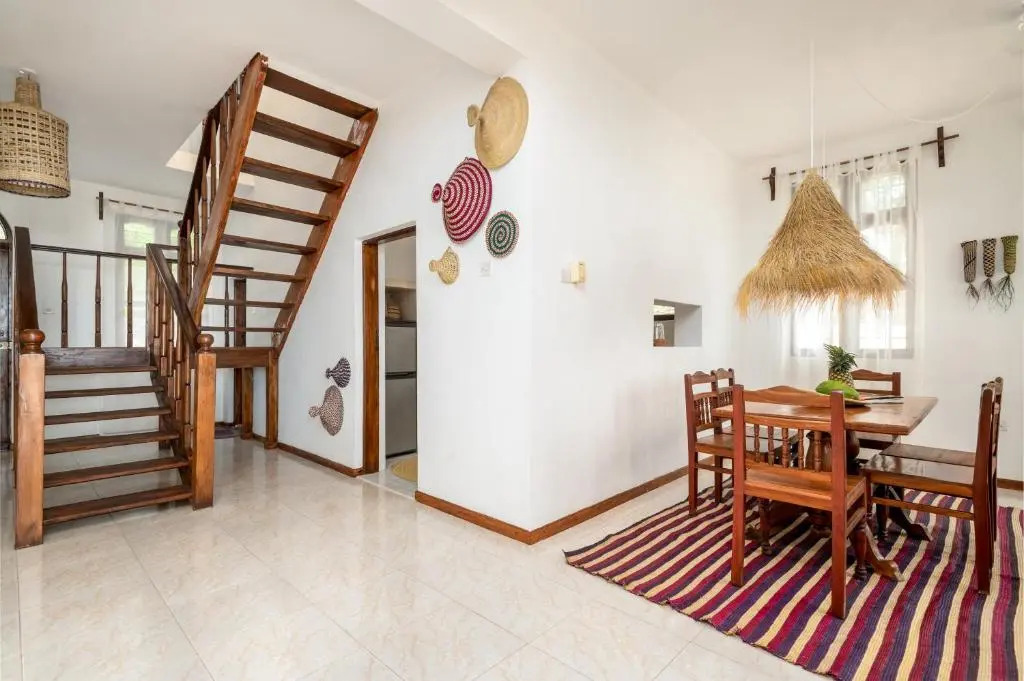 KIMA Serviced Beach House & Suites