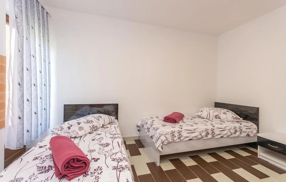 Four-Bedroom Holiday Home In Pakostane