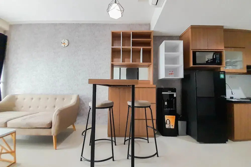 Elegant and Spacious 1BR at Patraland Amarta Apartment By Travelio