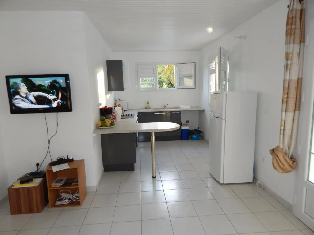 Maison de 2 chambres avec jardin clos et wifi a Sainte Anne a 5 km de la plage