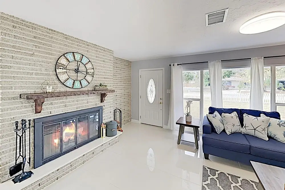 New Listing! Updated W/ Caged Pool & Patio 4 Bedroom Home