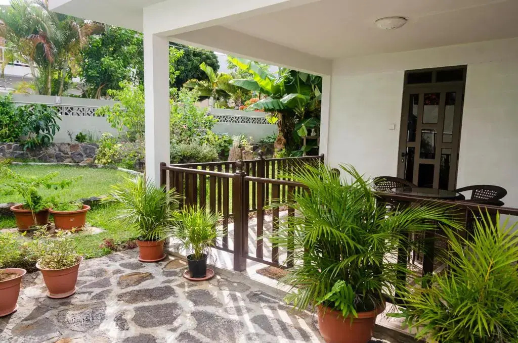 R&G Justlikehome Apartment 1 with blue sofa set and Apartment 2 with Garden View with brown sofa set