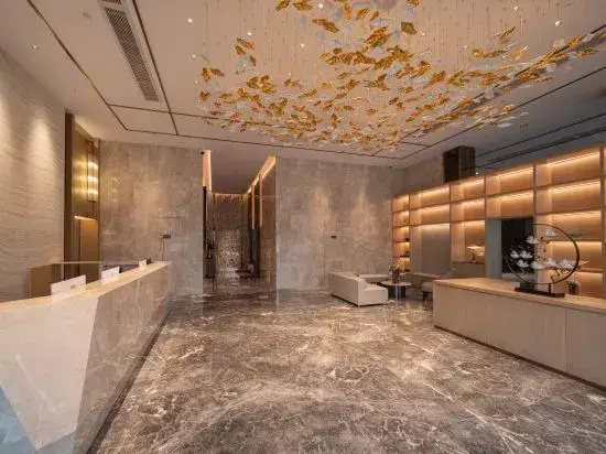 BaiLiQuanZhiJiuDian Hotel (Jiangmen Binjiang Sports Center)