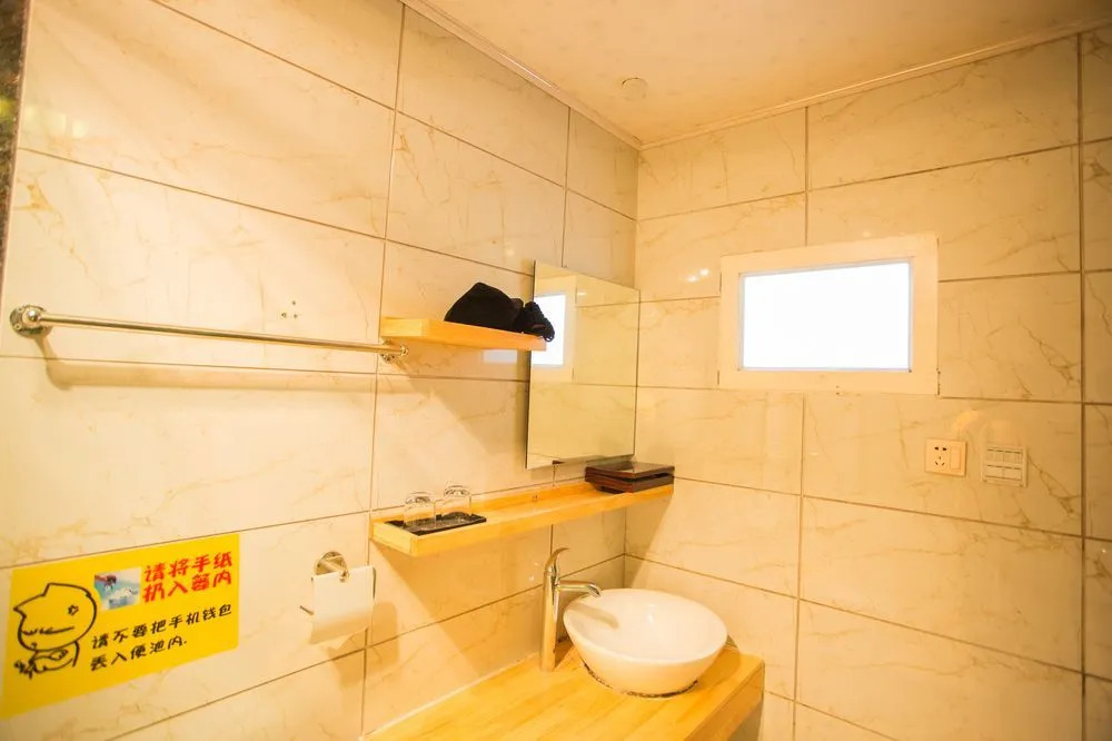 Lijiang Mufu Bieyuan Inn