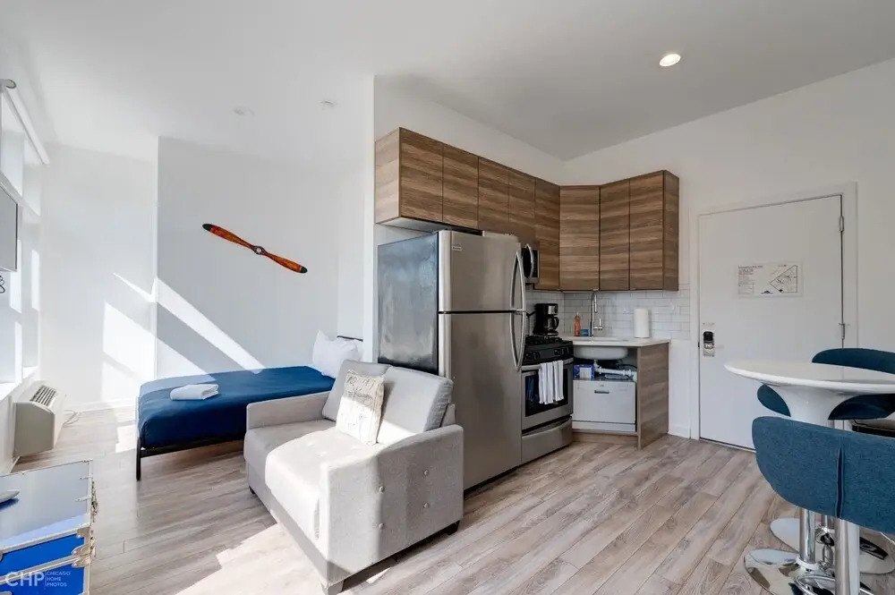 Steps From (Arguably) The Best Pizza Spot In Chicago - Experience The Local Chicago Lifestyle - 747 Lofts Cabin 208  by RedAwning