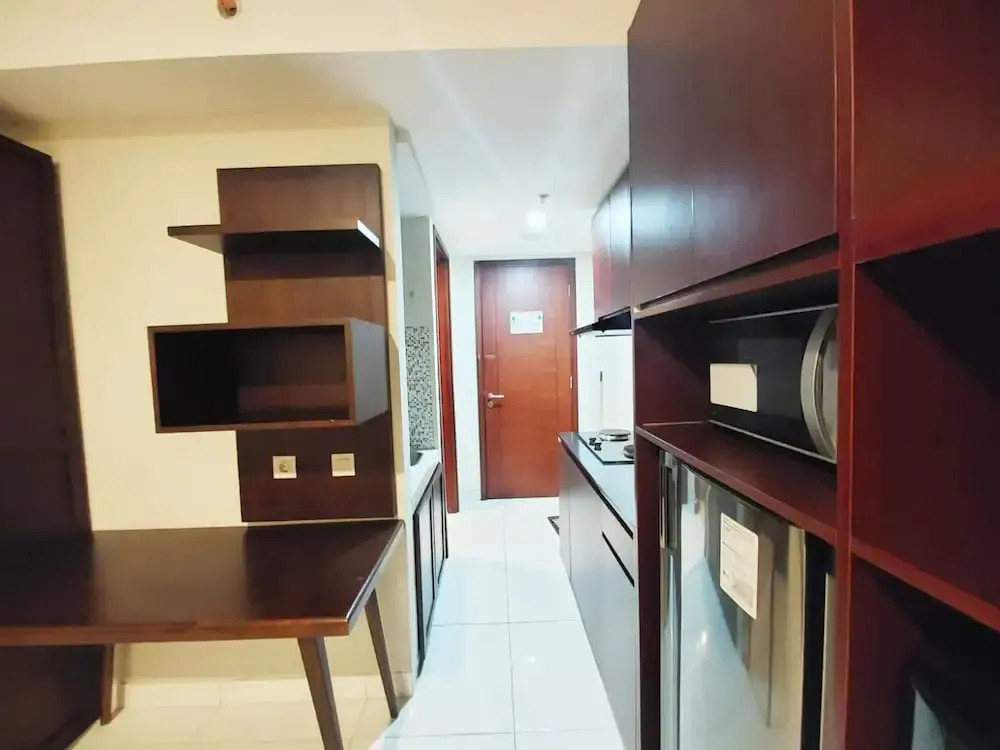 Brand New and Homey Studio at Mataram City Apartment By Travelio