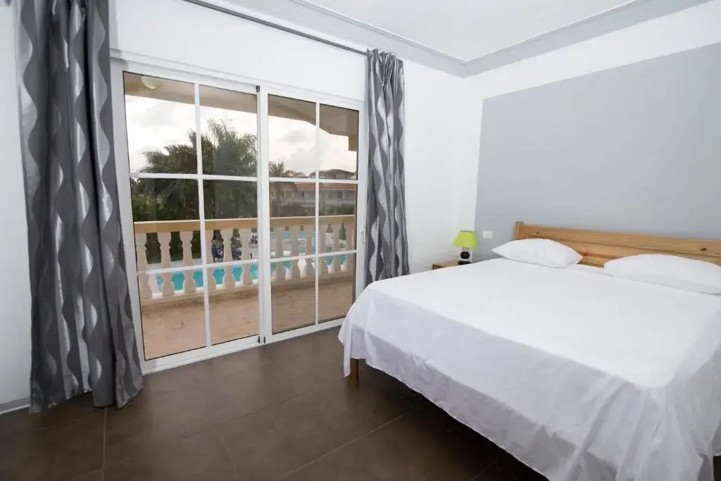 Residencial Las Palmeras de Willy Boca Chica