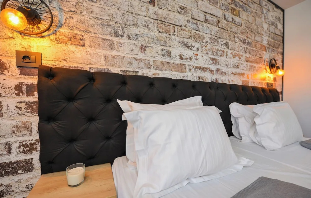 One by One by Grand Accommodation