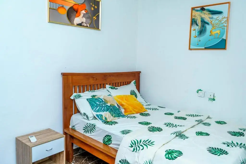 NAIVELI-PALM Appartement meublé sobre et chic