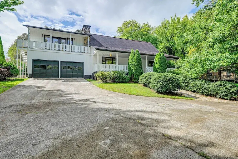 Porch, Yard & Creek Access: Spacious Sylva Home!