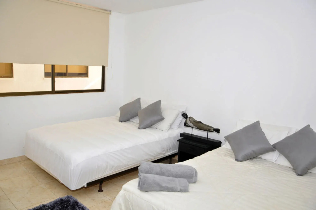 Отель Axis Inn by GEH Suites
