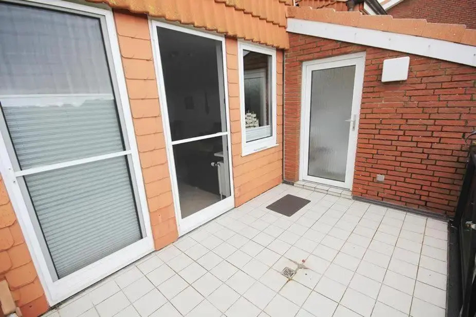 Ferienwohnung-10-mit-Balkon-Garten-Landhaus-Hubertus-Duhnen