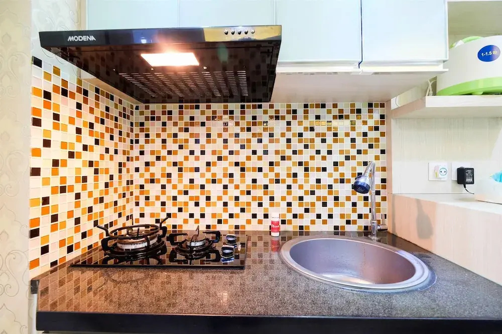 Pool View 2BR Bassura City Apartment By Travelio