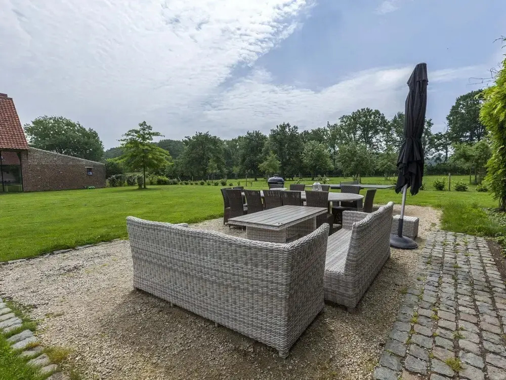 beautifull renovated farmhouse with traditional elements and a big garden