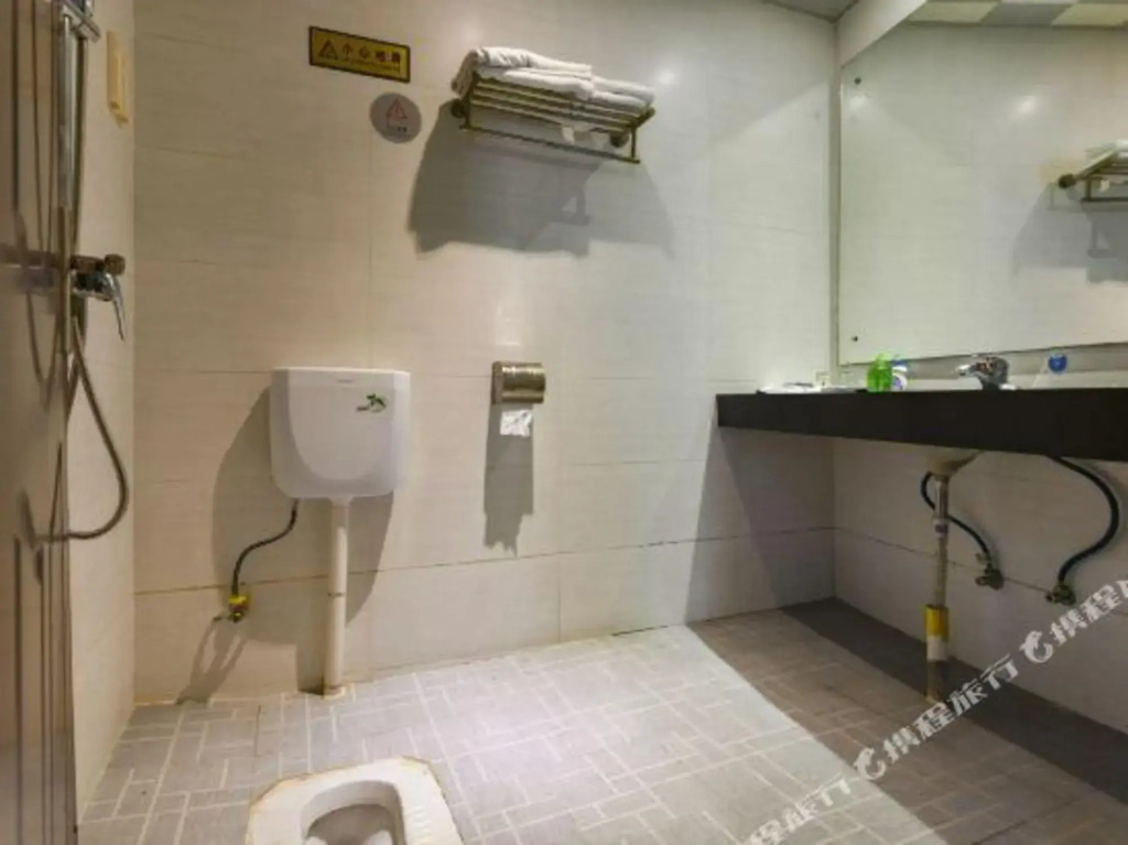 Dongguan Xinyi Business Hotel (Xingtai Academy)