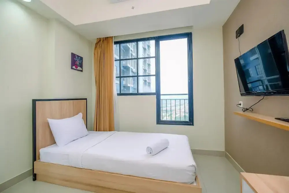 Nice 2Br At 26Th Floor Evenciio Margonda Apartment