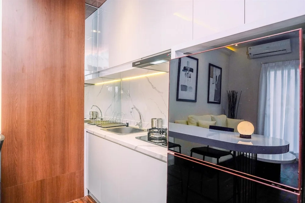 Good Deal High Floor 2BR at Transpark Cibubur Apartment By Travelio
