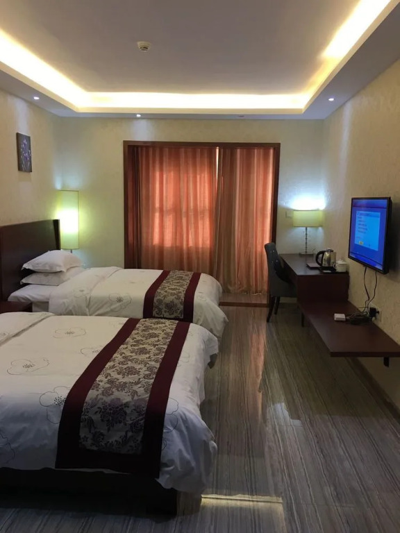 Tie Cheng Apartment Hotel
