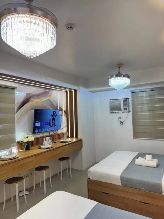 Relax in Pasay City's Best Kept Secret - Spacious Condo With Garden View