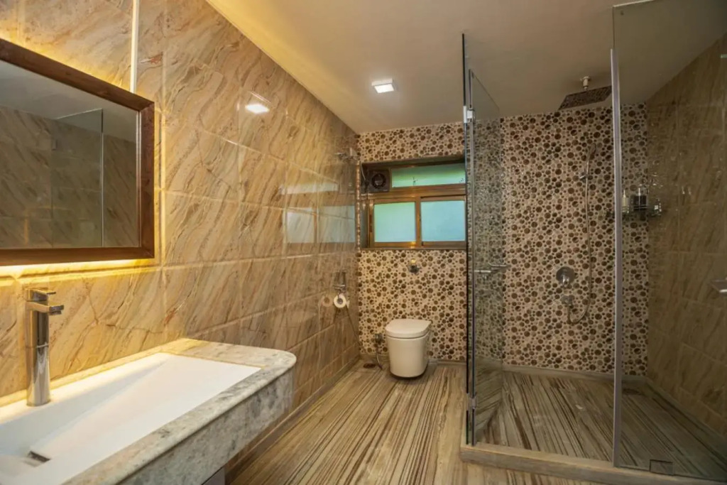 SaffronStays Aura, 4 BR Luxury Pool Villa with Game Room & Lawn