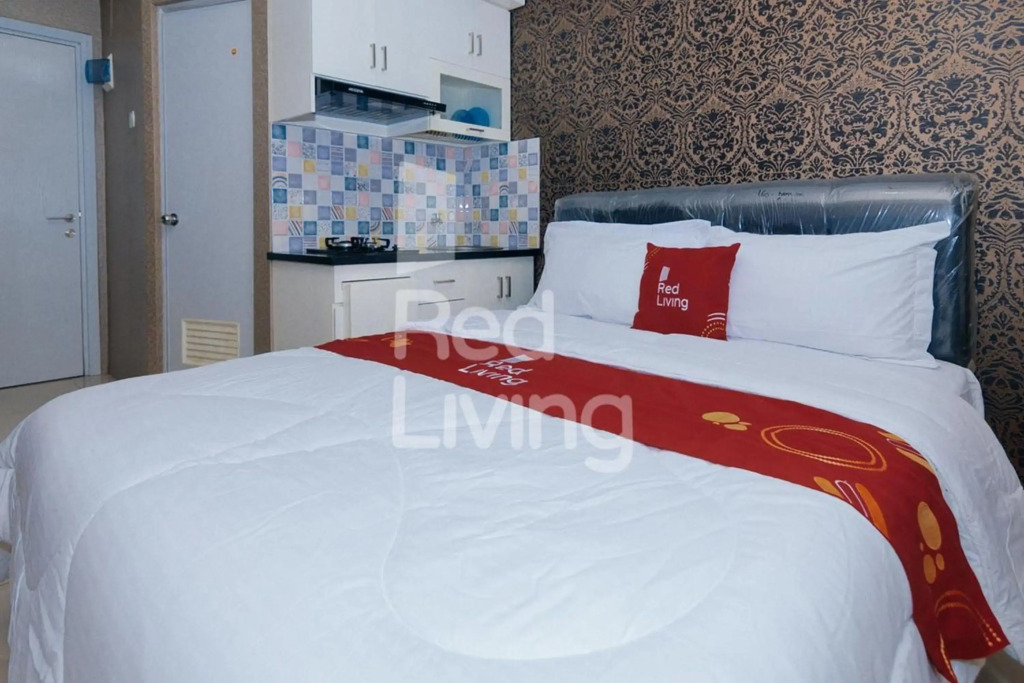 RedLiving Apartemen Green Pramuka - Family Group Tower Orchid
