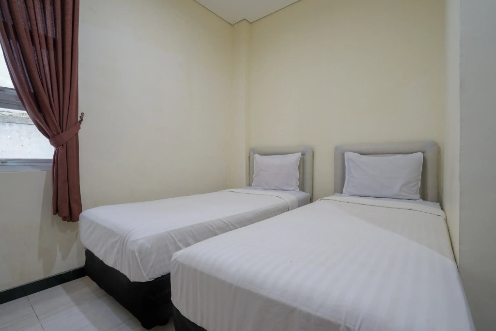 RedDoorz Syariah Near Transmart Mall Palembang
