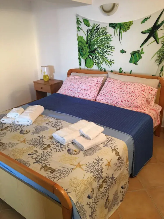 Villa rosa fronte mare