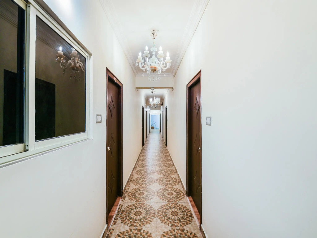 Collection O 24414 Hotel Naidu Grand Rooms