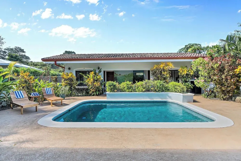 Stylish Home with Chic Decor, Luxury Amenities & Tropical Outdoor Oasis with Sparkling Private Pool
