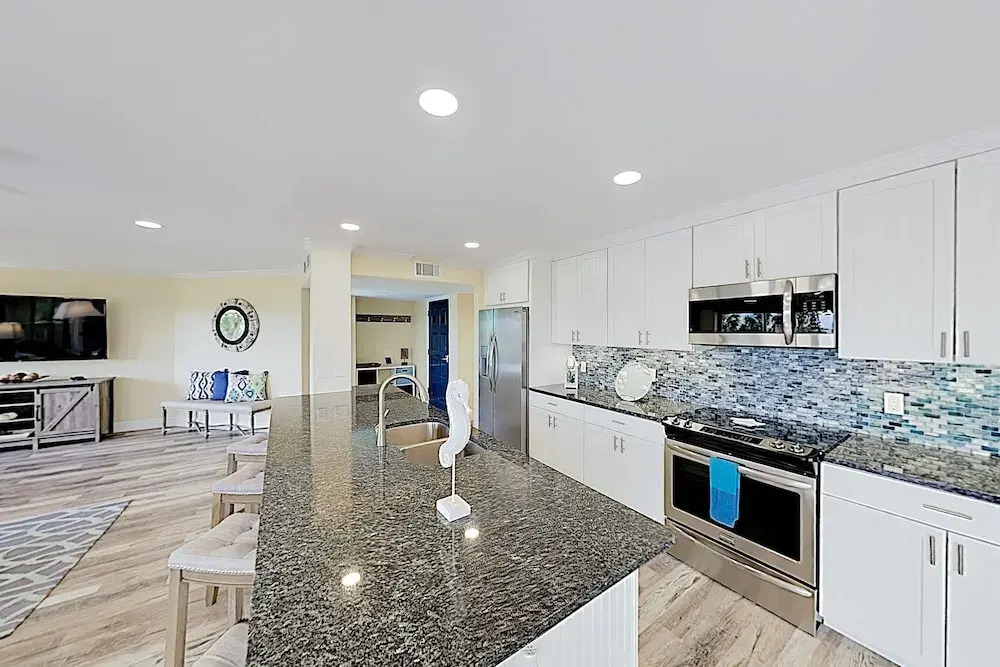 New Listing! Updated Corner Unit W/ Beach Path 3 Bedroom Condo