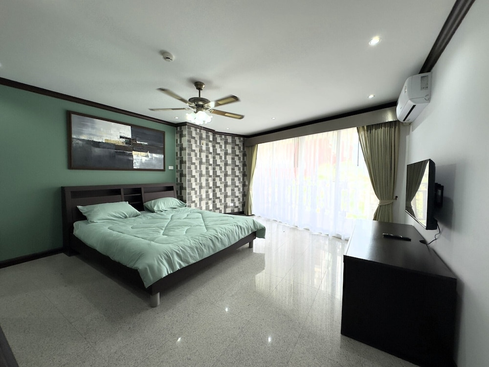 Spacious 2BR Condo - 3 Balconies & Green Views