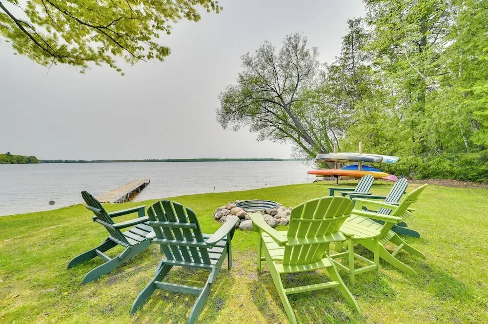 Cozy Carp Lake Cottage w/ Dock, Kayaks & Fire Pit